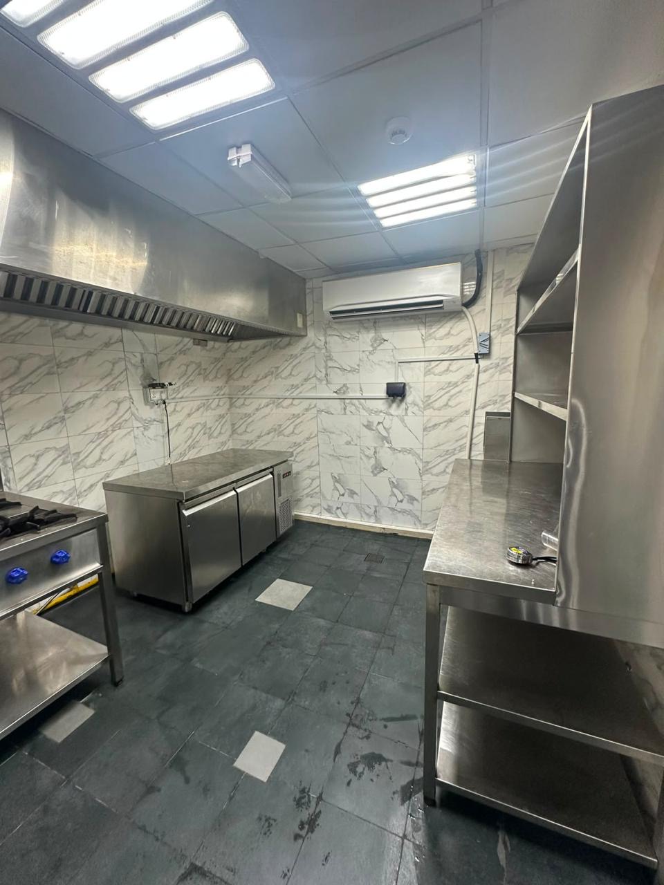 Private commercial kitchen with stainless worktops and extraction at Kitchen Works