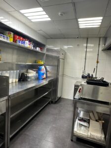 Storage shelving and preparation area at Kitchen Works in Al Quoz 4, Dubai
